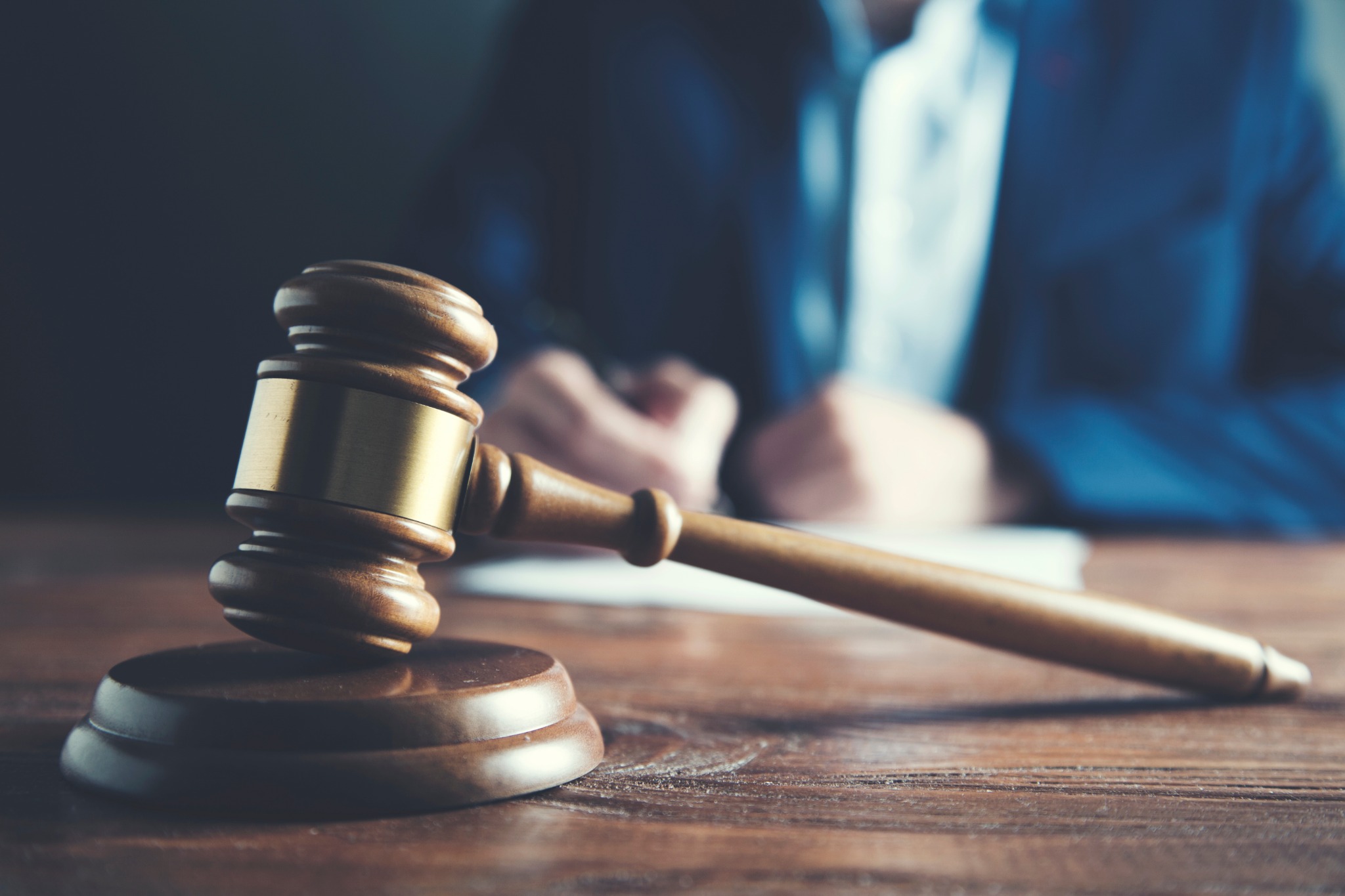 Gavel and attorney reviewing an injury claim